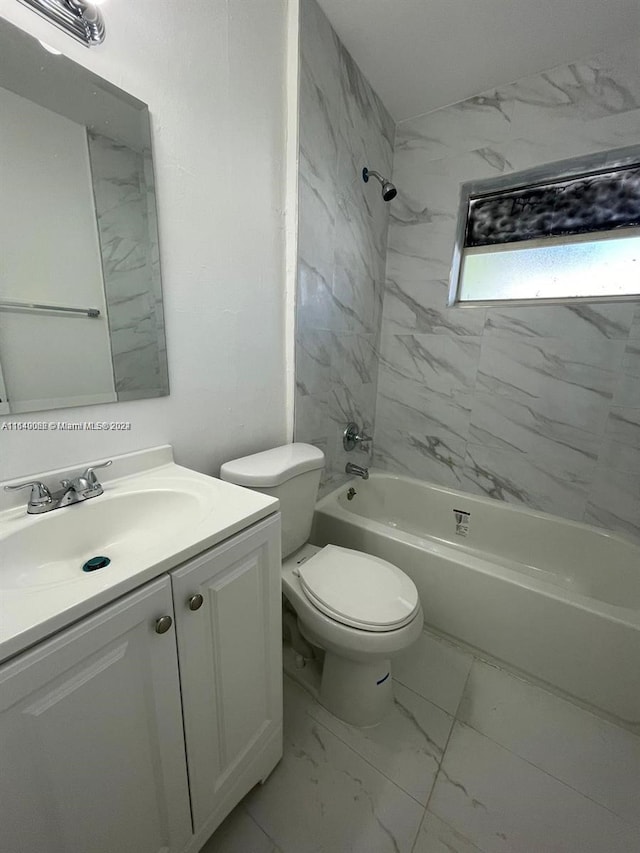 bathroom featuring toilet, shower / tub combination, vanity, and marble finish floor