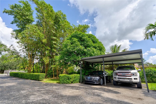 view of parking with a carport