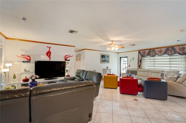 tiled living room with a textured ceiling, crown molding, and ceiling fan