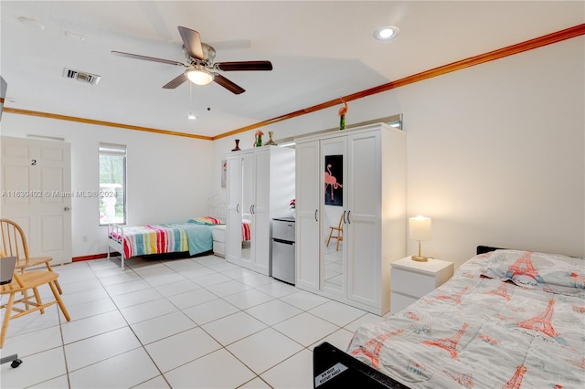 bedroom featuring crown molding, ceiling fan, and light tile patterned flooring