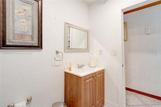 bathroom with vanity and tile patterned flooring