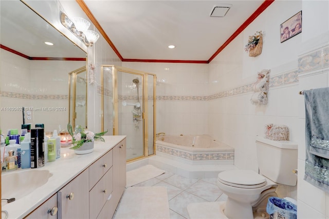 full bathroom with separate shower and tub, tile patterned floors, toilet, tile walls, and vanity