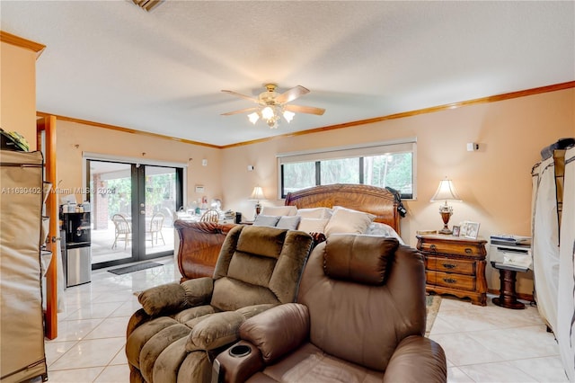 bedroom with light tile patterned floors, crown molding, french doors, access to outside, and ceiling fan