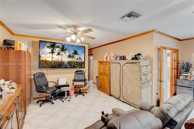 tiled office space featuring crown molding, a textured ceiling, and ceiling fan