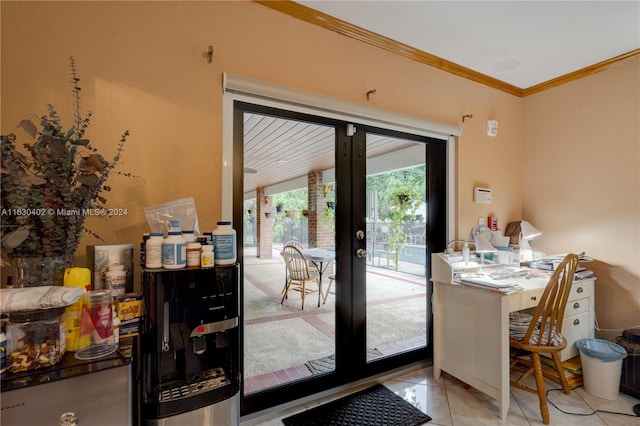 entryway with ornamental molding, light tile patterned flooring, and french doors