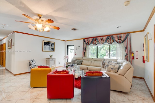 tiled living room featuring ceiling fan and ornamental molding