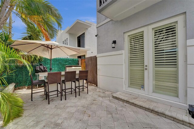 view of patio / terrace featuring exterior bar