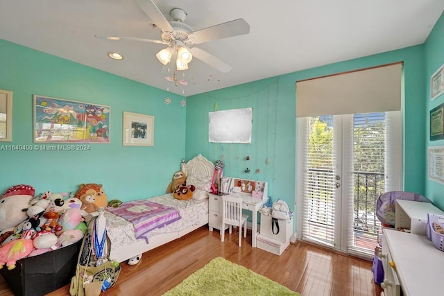 bedroom with ceiling fan, recessed lighting, wood finished floors, access to outside, and french doors