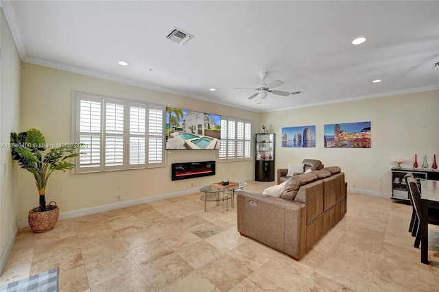 living room with ceiling fan, ornamental molding, and light tile patterned floors