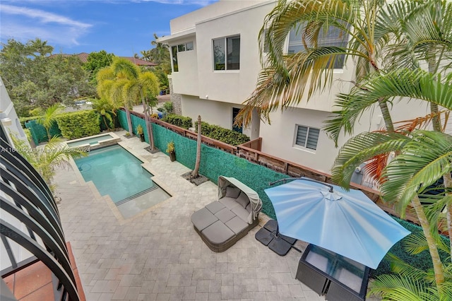 view of swimming pool with a patio