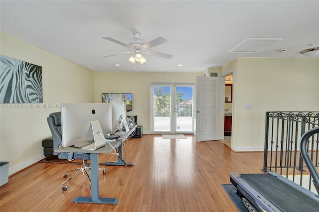 workout room featuring attic access, baseboards, wood finished floors, and recessed lighting