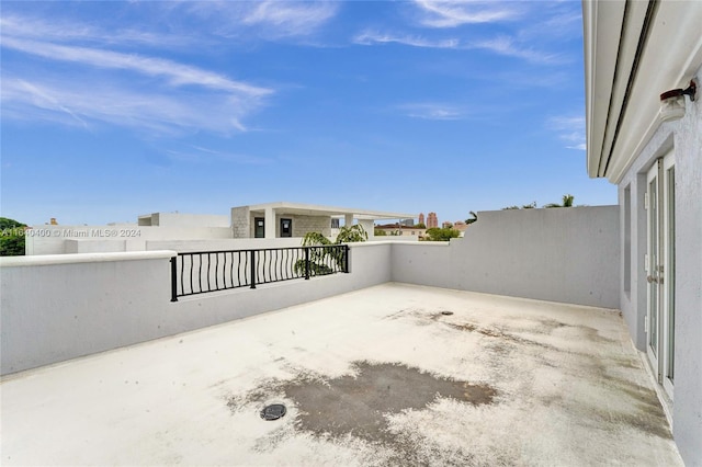 view of patio / terrace with a balcony