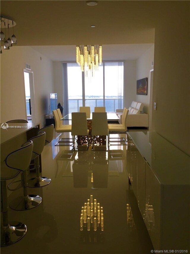 dining room featuring a notable chandelier