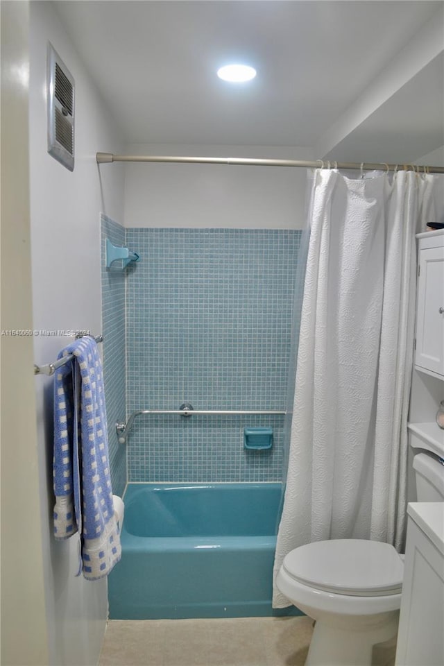 full bathroom with toilet, shower / bath combo with shower curtain, and vanity