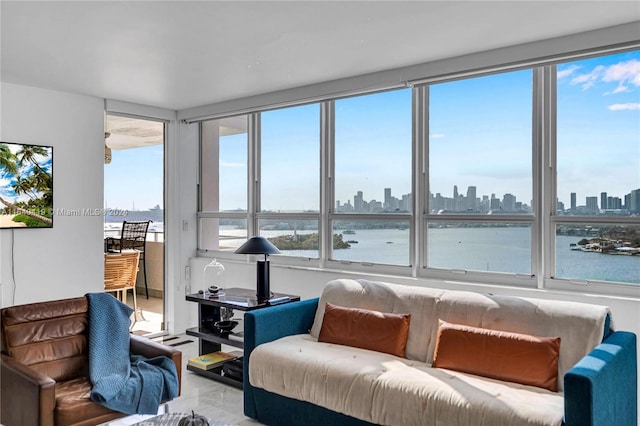 sunroom / solarium with a water view