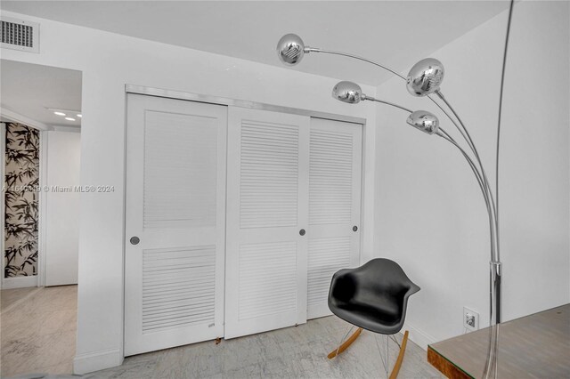 sitting room with light tile patterned floors