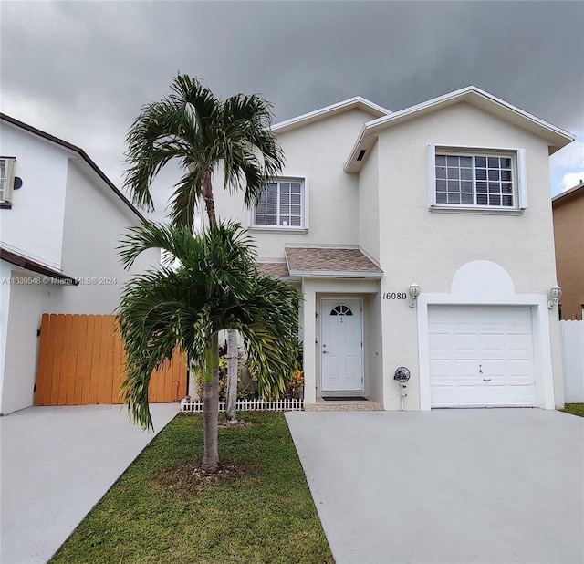 view of front of property with a garage