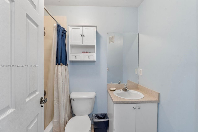 full bathroom with vanity, toilet, and shower / bathtub combination with curtain