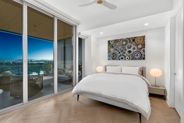 bedroom with access to exterior, light parquet floors, and ceiling fan