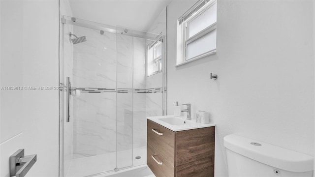 4260 SW 149th Ct, Miami, FL 33185 - bathroom featuring toilet, vanity, and a marble finish shower