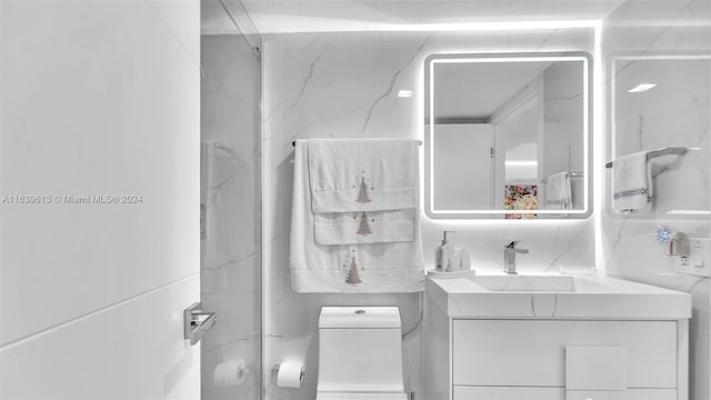 4260 SW 149th Ct, Miami, FL 33185 - full bathroom featuring toilet, vanity, and a marble finish shower