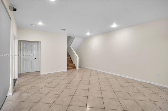 spare room with light tile patterned floors