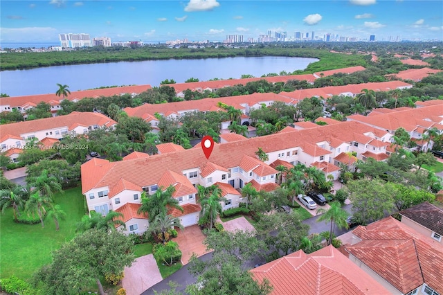 drone / aerial view featuring a water view