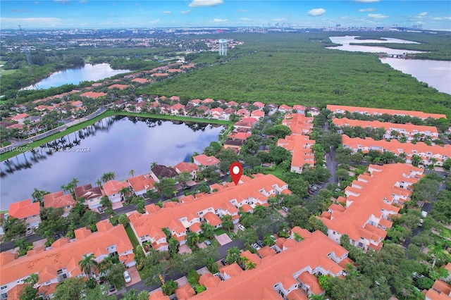 drone / aerial view featuring a water view