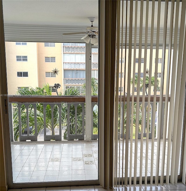 doorway to outside with a wealth of natural light and ceiling fan