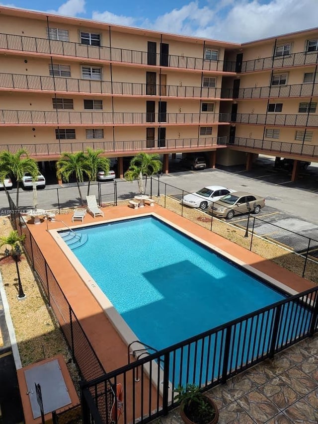 view of pool featuring a patio