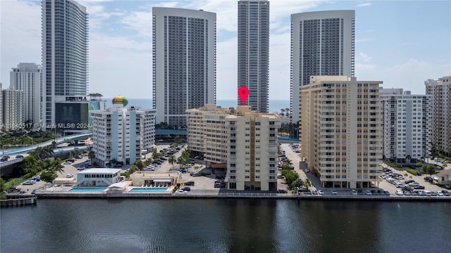 property's view of city featuring a water view