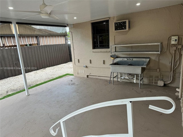 view of patio / terrace featuring ceiling fan