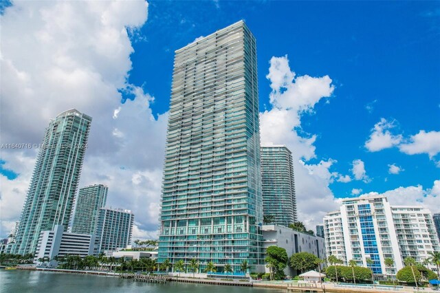 view of building exterior with a water view