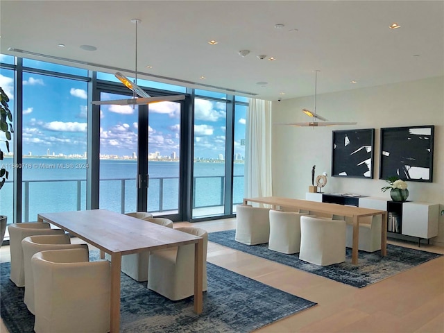 interior space featuring french doors and a water view