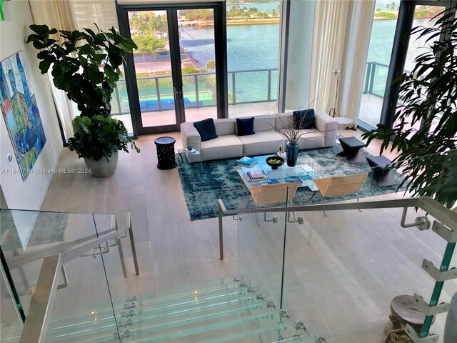 living room featuring french doors and hardwood / wood-style floors