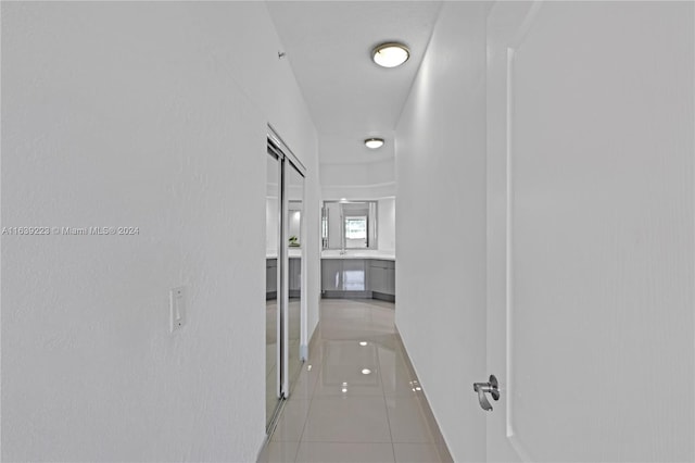 corridor featuring tile patterned floors