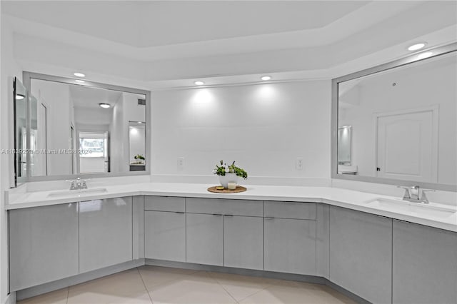 full bathroom with tile patterned floors, a sink, recessed lighting, and double vanity