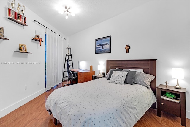 bedroom featuring hardwood / wood-style flooring