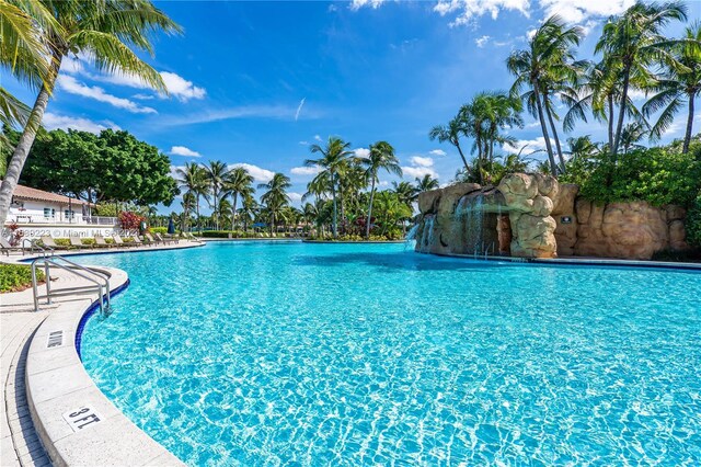 view of pool featuring pool water feature