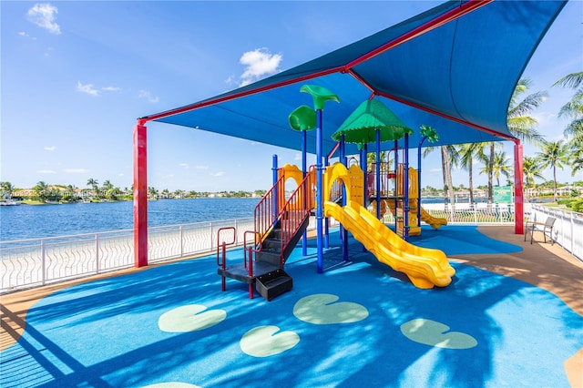 view of jungle gym featuring a water view