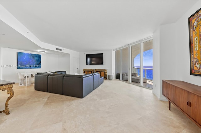 living room with a wall of windows