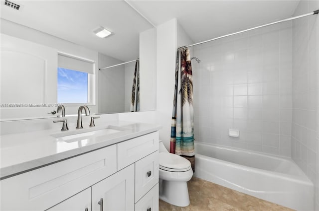 full bathroom featuring tile patterned flooring, vanity, shower / bath combination with curtain, and toilet