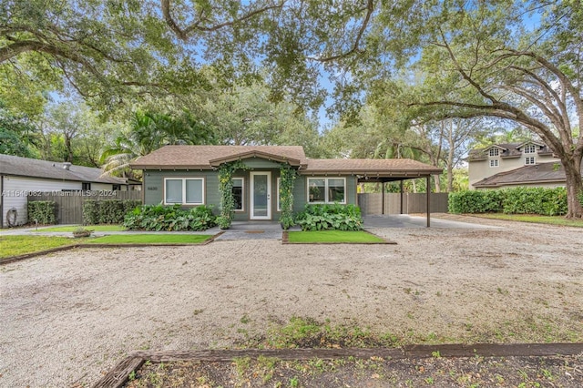 view of front of property with a carport