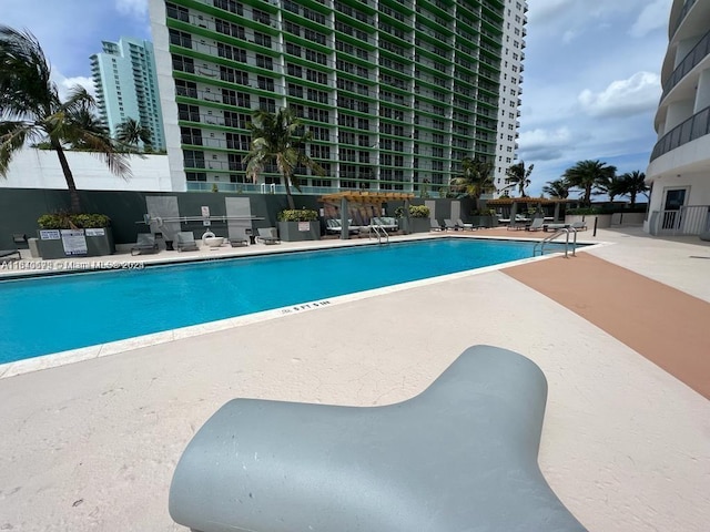 pool featuring a patio