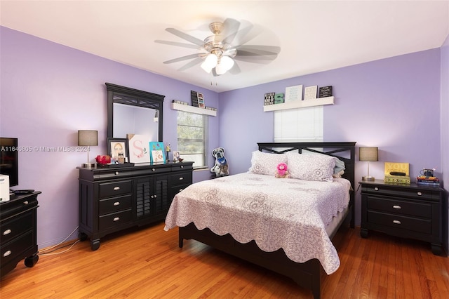 bedroom featuring ceiling fan and light wood-type flooring