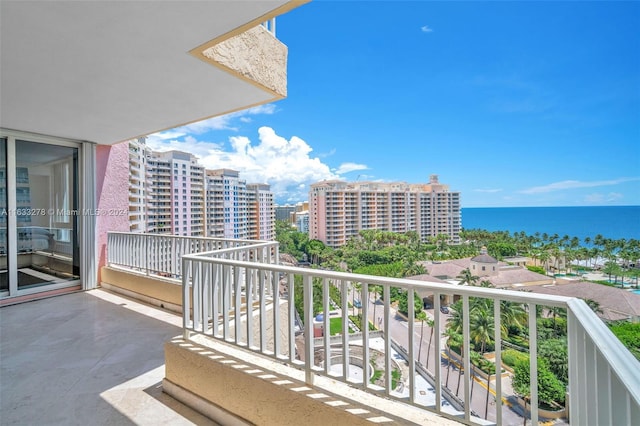 balcony featuring a water view