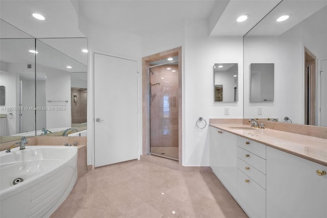 bathroom featuring independent shower and bath and vanity