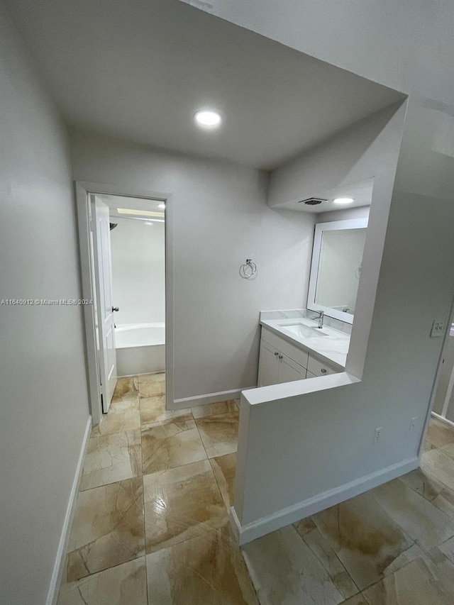 bathroom featuring vanity and tile patterned flooring