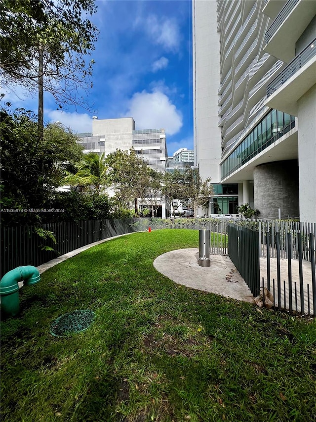 view of yard featuring a balcony