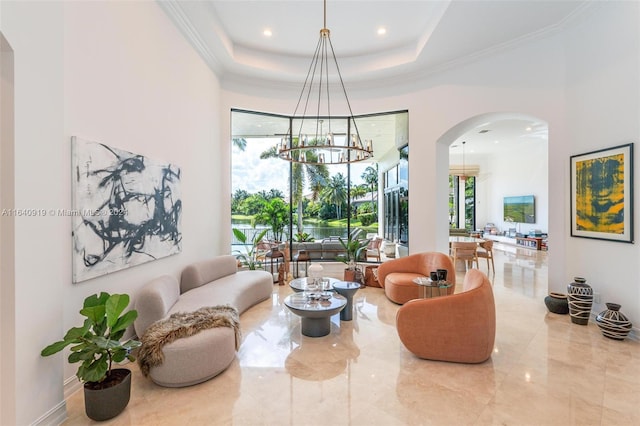 interior space featuring light tile patterned flooring, a notable chandelier, and a raised ceiling